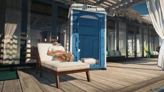 Agent 47 lounges at the beach, a porta-potty looming behind him.