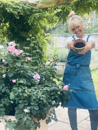 Clodagh McKenna with compost and roses
