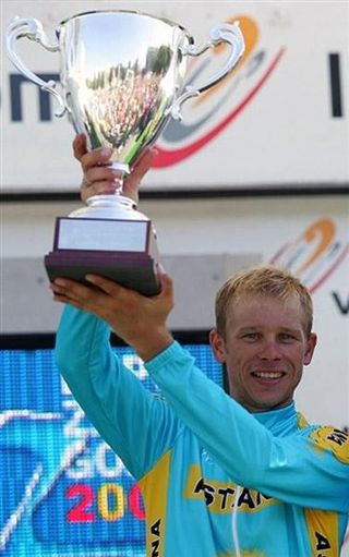 Andrey Kashechkin of Astana holds aloft the trophy