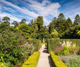 Sandringham estate garden walkways with border flowers
