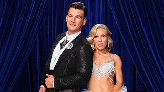 DWTS pro Sharna Burgess posing with her celebrity partner Tyler Cameron in Season 35.