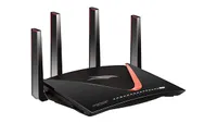 Netgear Nighthawk XR700 wireless router shown in black colorway and on a white background.