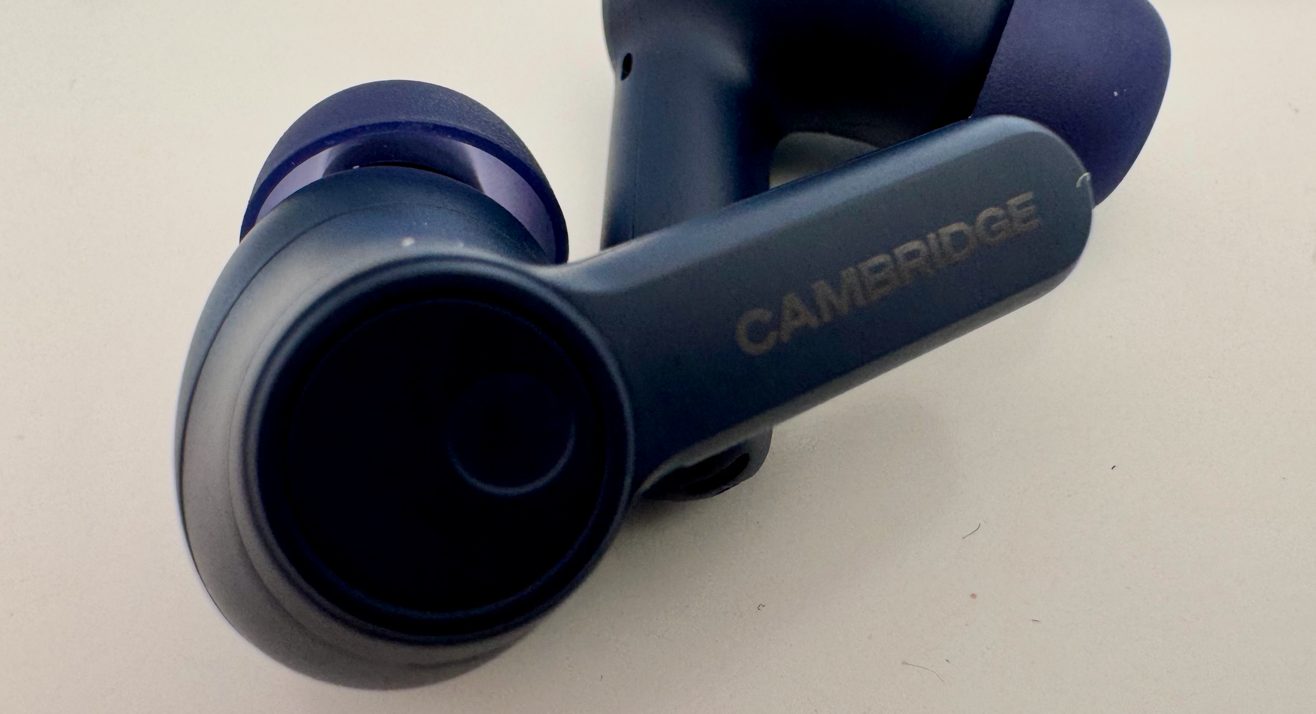 Cambridge A100 SE in black, on a white table