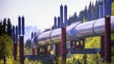 The Alaskan Pipeline winds through mountains.