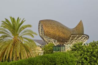 Fish (El Peix) modern steel sculpture, architectural landmark designed by Frank Gehry in Barcelona Spain Europe.