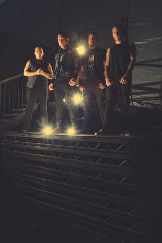 Trivium (left to right): Paolo Gregoletto, Matt Heafy, Corey Beaulieu, Mat Madiro