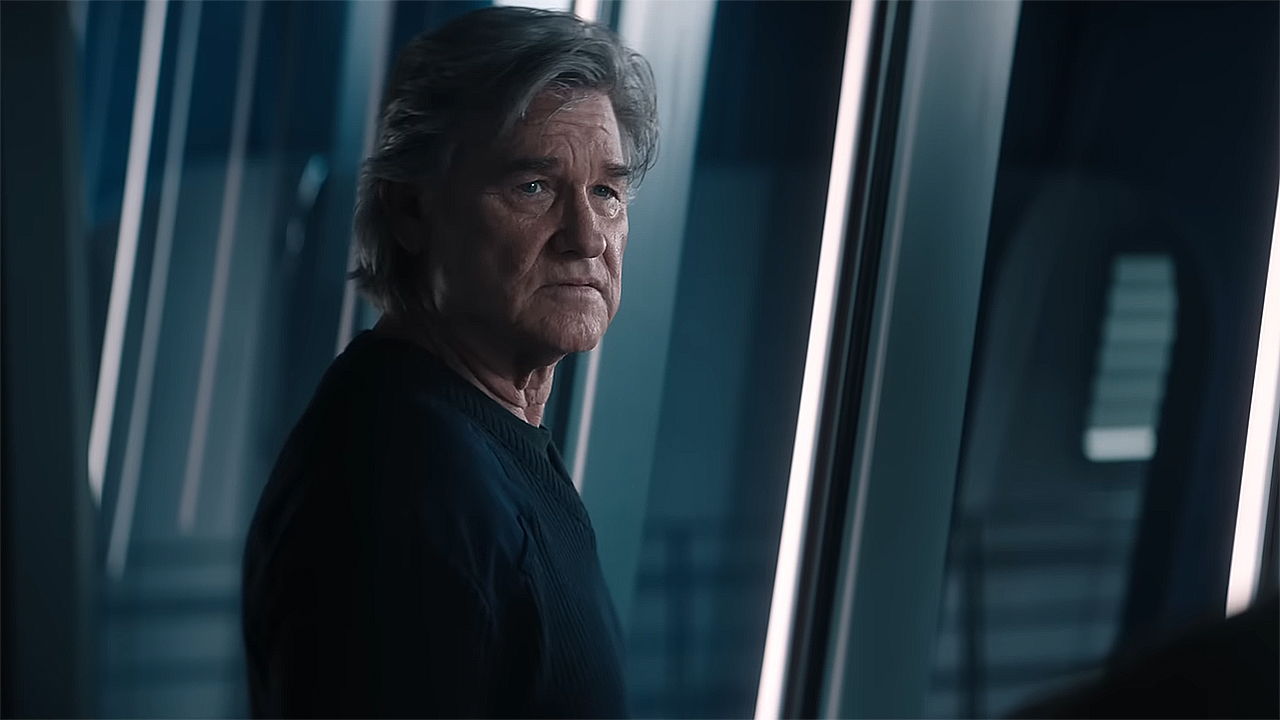 Lee Shaw looking at someone off-camera in Monarch: Legacy of Monsters season 2