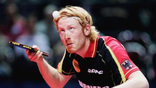Christian Suss of Germany serves ahead of the 2024 ITTF World Table Tennis Championships