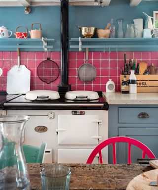 Colorful kitchen in Grade II listed farmhouse in Sussex