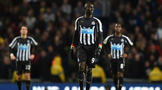 A dejected Papiss Demba Cisse of Newcastle United looks on after they conceding a third goal during the Barclays Premier League match between Manchester City and Newcastle United at Etihad Stadium on February 21, 2015 in Manchester, England. (Photo by Michael Regan/Getty Images)