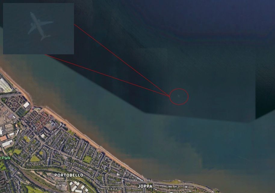 A ghostly image of an airplane shows up off the coast of Edinburgh on Google Earth.