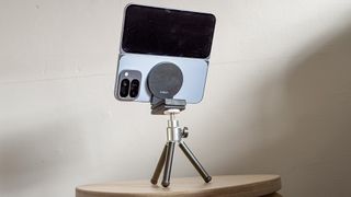 Google Pixel 10 Pro Fold on a tripod with a Belkin MagSafe stand, facing away from the camera