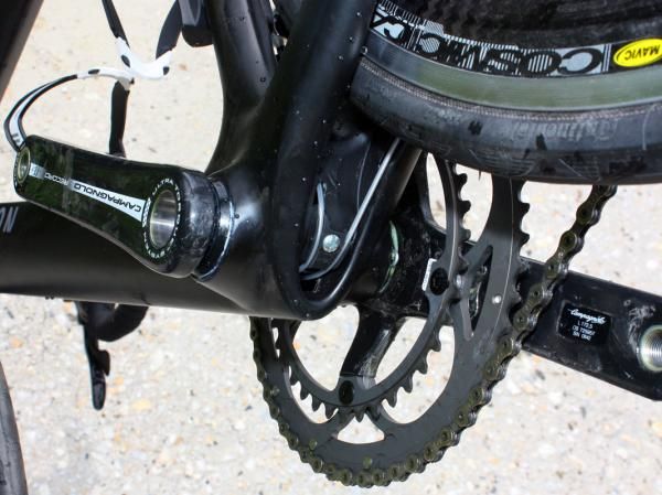 Cables make a brief appearance down at the bottom bracket before heading back inside the frame on their way to the derailleurs.