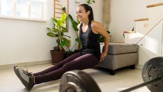 Woman using bench to work out at home