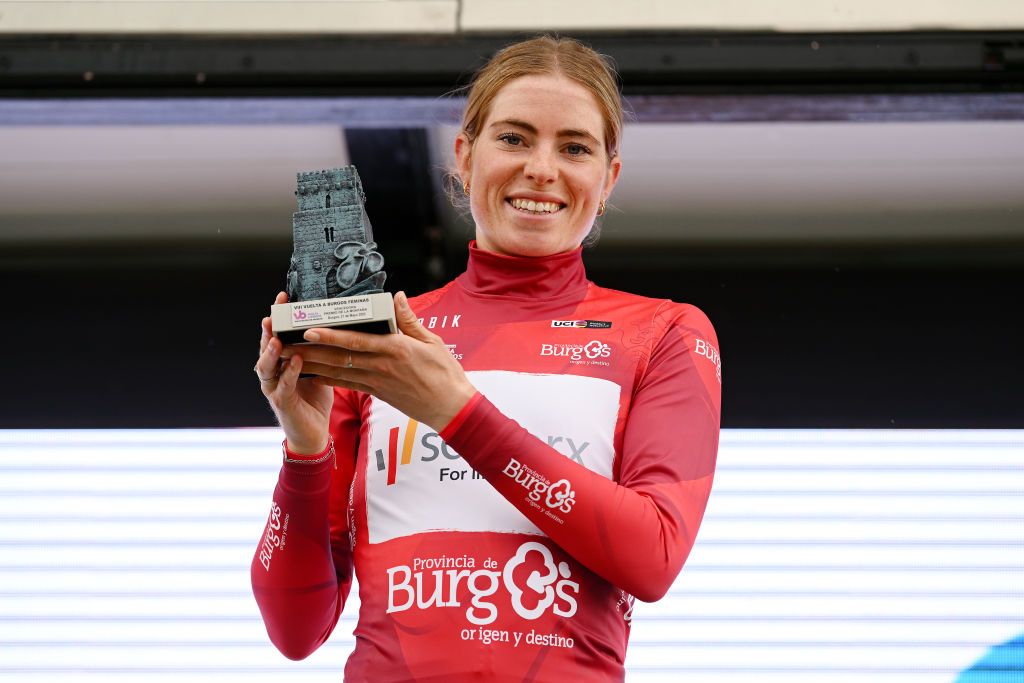 LAGUNAS DE NEILA SPAIN MAY 21 Demi Vollering of The Netherlands and Team SD Worx celebrates at podium as Red Mountain Jersey winner during the 8th Vuelta a Burgos Feminas 2023 Stage 4 a 1215km stage from Tordmar to Lagunas de Neila 1867m UCIWWT on May 21 2023 in Lagunas de Neila Spain Photo by Dario BelingheriGetty Images