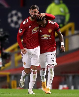 Manchester United’s Bruno Fernandes (left) celebrates scoring his side’s first goal of the game with team-mate Fred