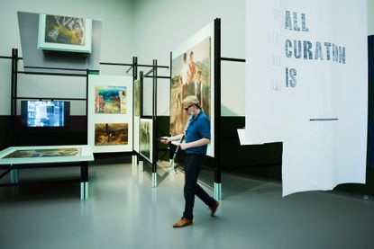 Designer Simon Dogger navigates his way around artworks in the Van Abbemuseum in Eindhoven using his Tik-Tik app.