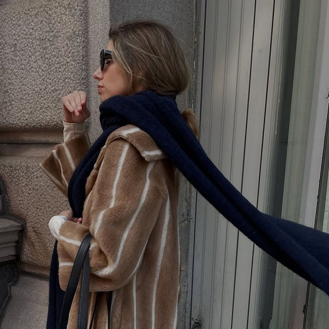 woman wearing a long scarf