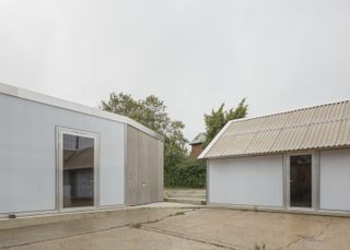 View from the courtyard, with living space to the left and bedroom wing to the right