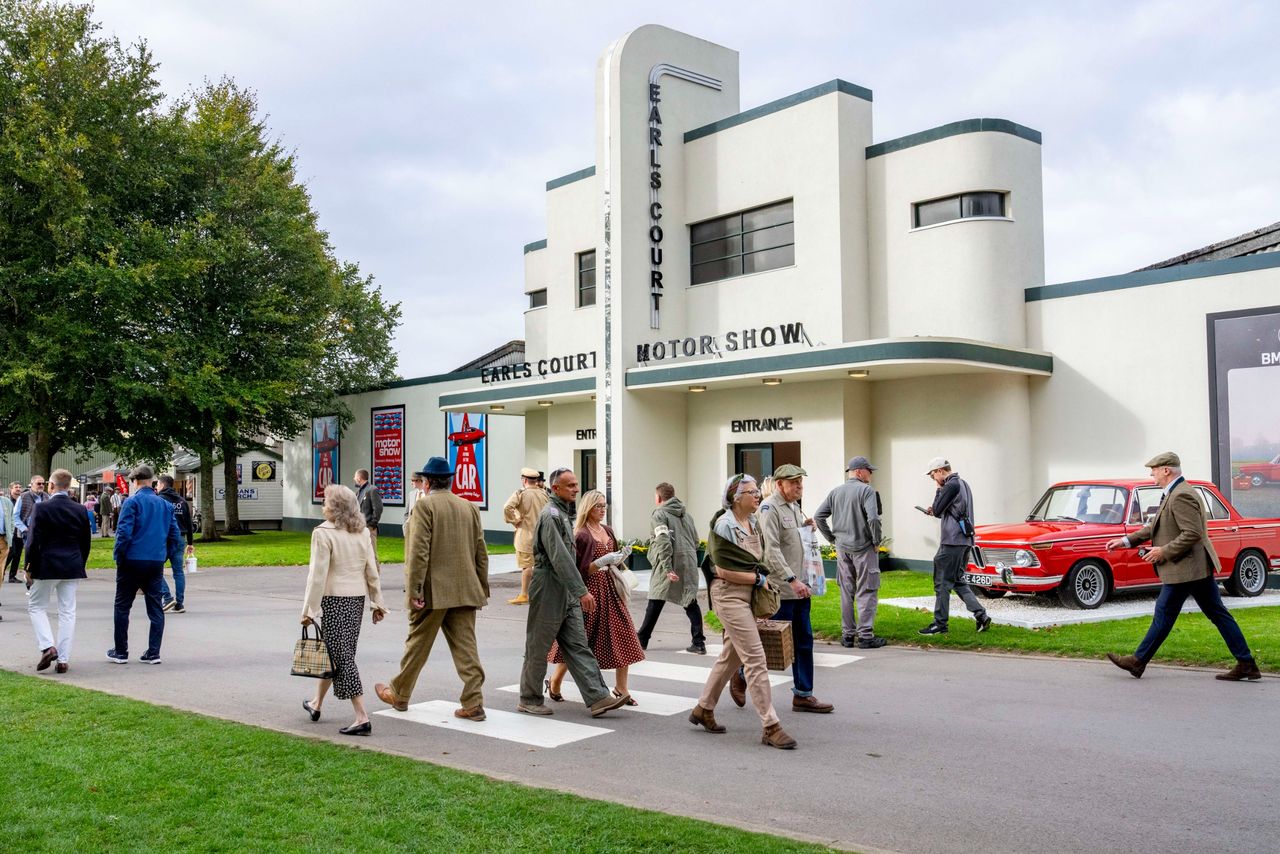 Images from the Revival. Fast cars, people in vintage dress, everyone having a nice time.