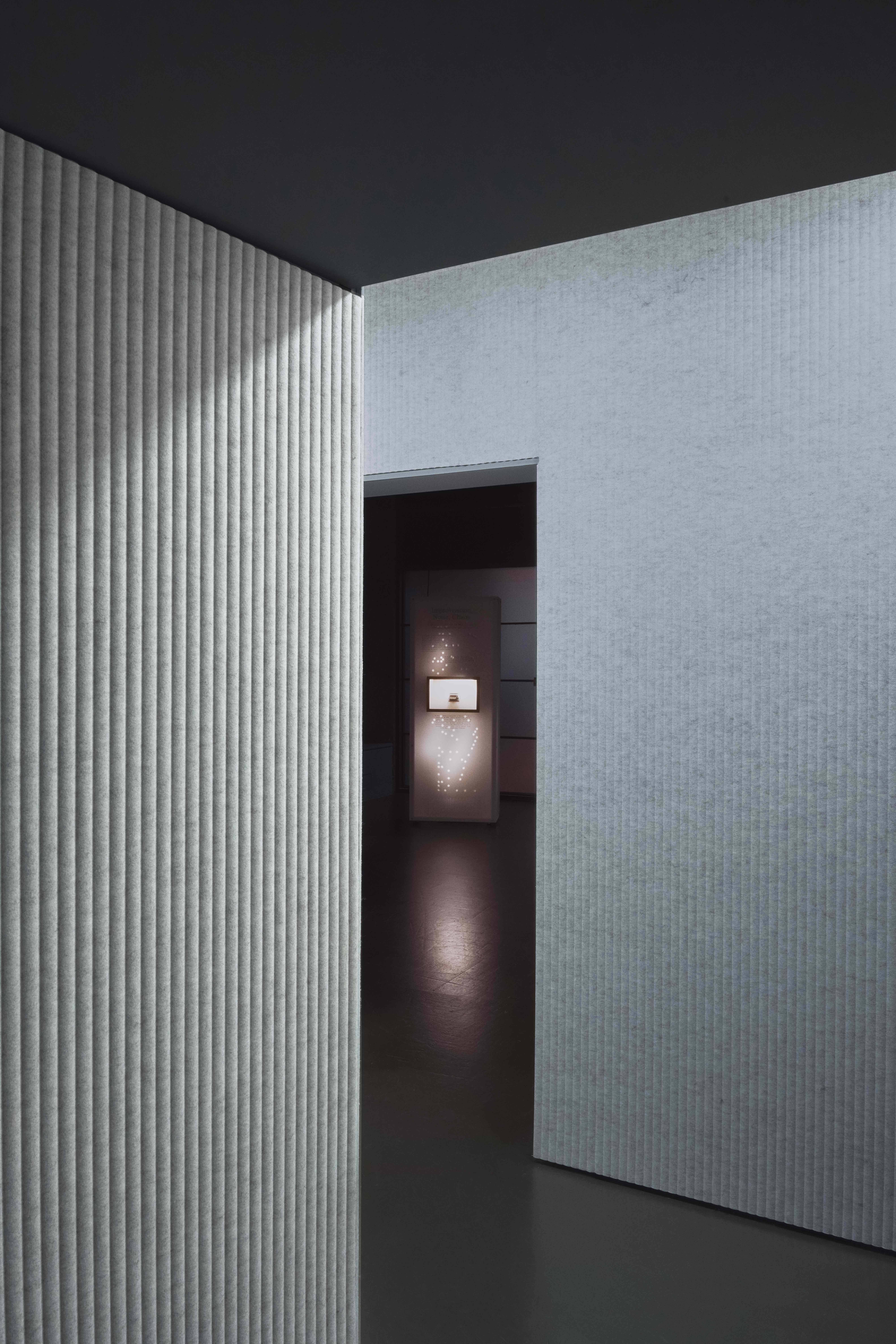 View through a doorway in an exhibition space