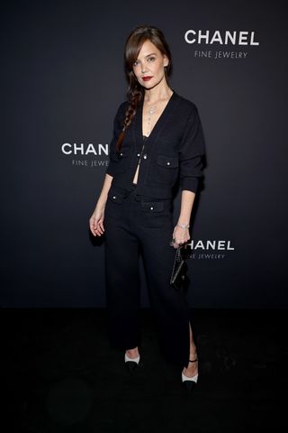 Katie Holmes at the Chanel Fine Jewelry dinner wearing a Chanel cardigan with a diamond necklace