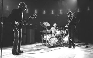 NEW YORK - NOVEMBER 2: Rock band "Cream" performs onstage at Madison Square Garden on November 2, 1968 in New York City, New York. L-R: Jack Bruce, Ginger Baker, Eric Clapton.