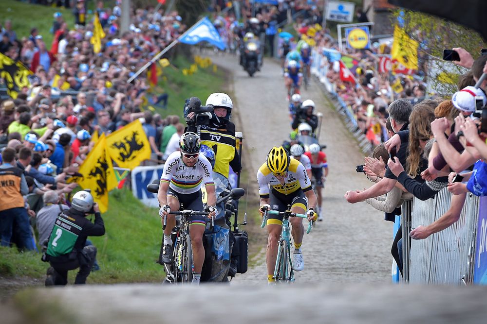 Peter Sagan of Tinkoff (L) and Belgian Sep Vanmarcke of Team LottoNL-Jumbo compete on the Paterberg during the 100th edition of the Tour of Flanders