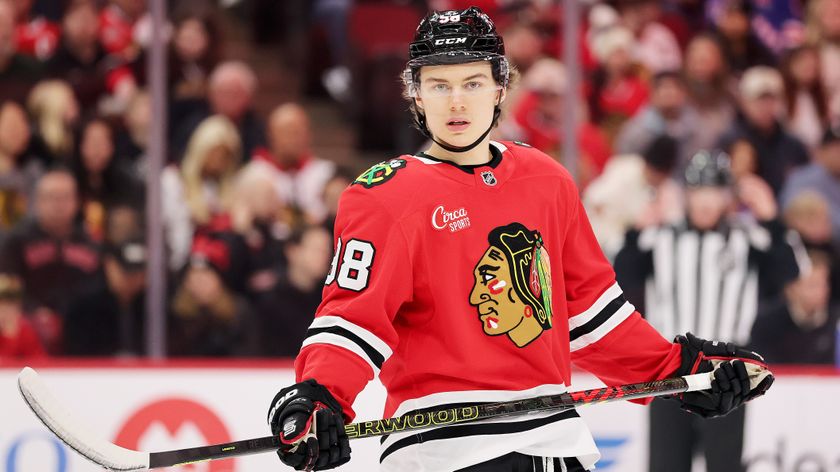  Connor Bedard #98 of the Chicago Blackhawks looks on against the New York Rangers during the first period at the United Center on January 05, 2025 in Chicago, Illinois. 