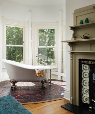 Isaac Slade's living room with bath tub