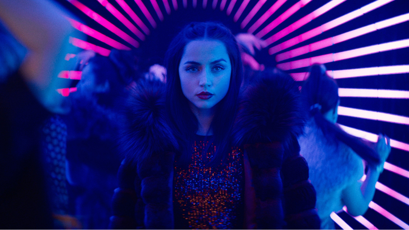 Ana de Armas as Eve Macarro, a young female assassin in Ballerina