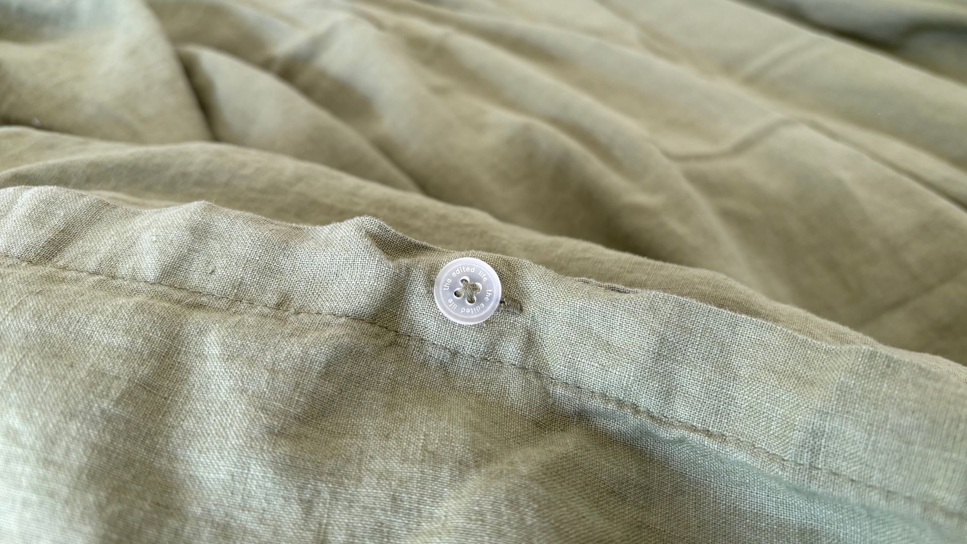 Button on the Dunelm Linen Bedding