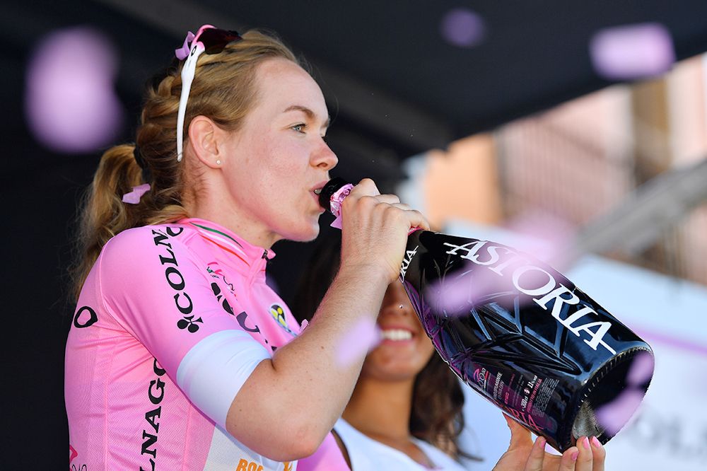 Anna van der Breggen celebrates in pink after stage 9 at the Giro Rosa