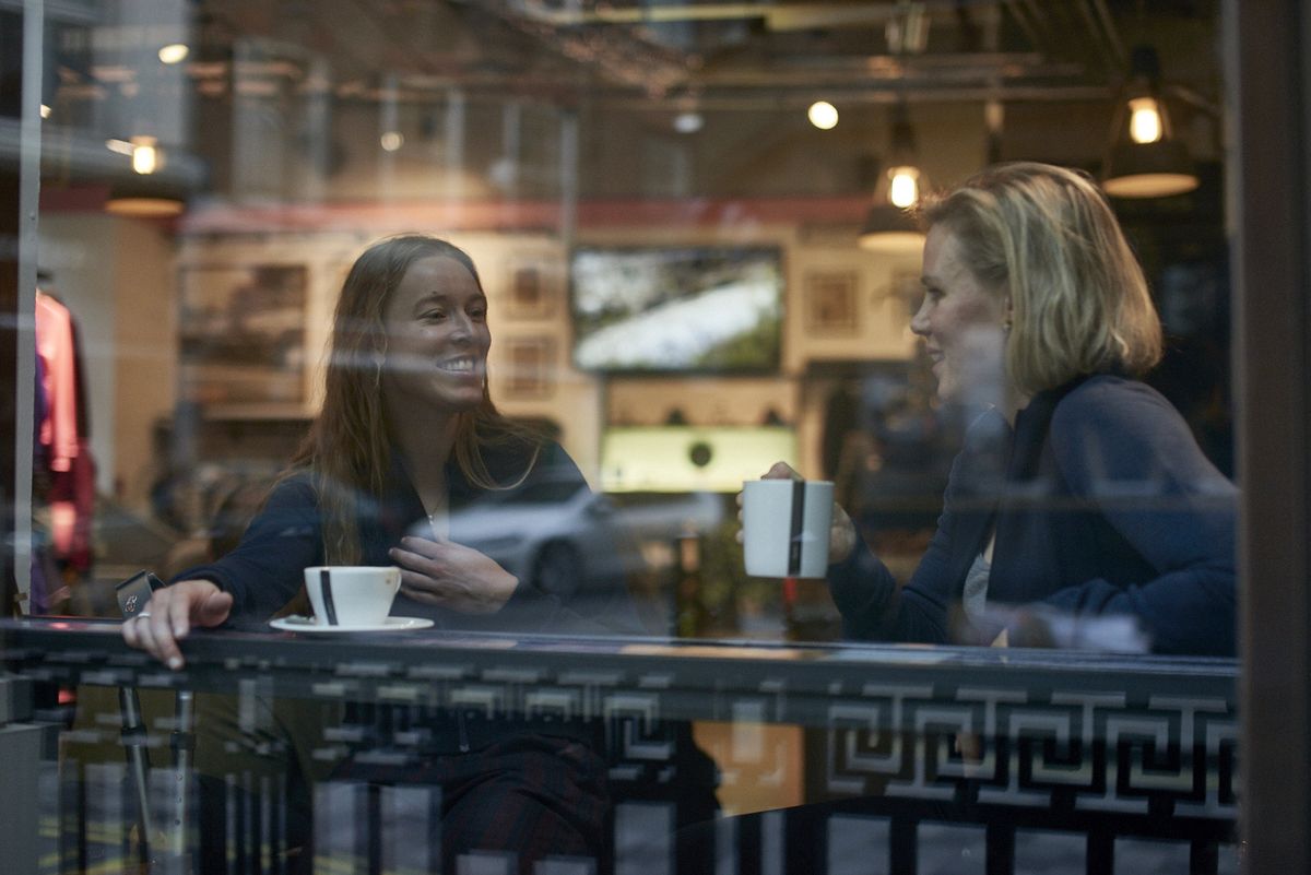 Tiffany Cromwell and Hannah Barnes enjoy a coffee in the London Rapha store