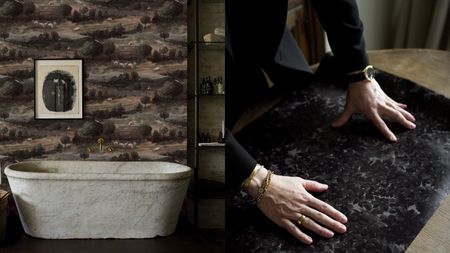 Split image. First is of a white marble bathtub in a dark, moody room with wallpaper that is a repeating pattern of the countryside. The second image is of Jeremiah Brent's hands touch a piece of black, textured wallpaper across a wooden table