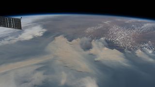 Thick clouds of brown smoke from Australia's bushfires spread across the Tasman Sea in this photo captured by an astronaut at the International Space Station. The photo was taken on Jan. 4, when the station was orbiting 269 miles (433 kilometers) above the Tasman Sea.