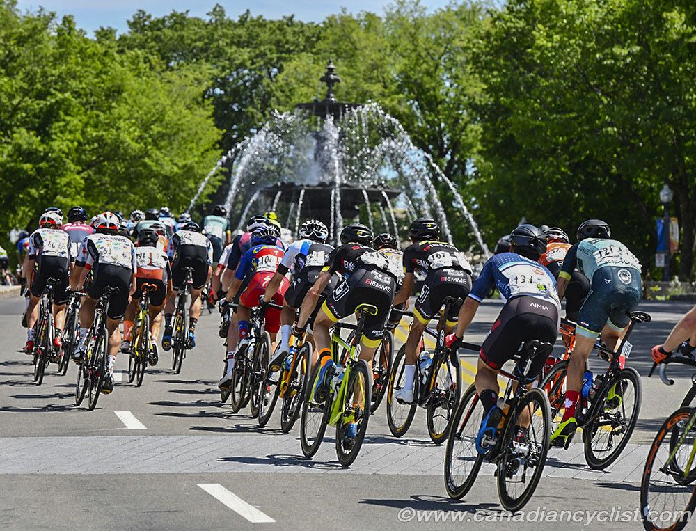 Peloton passing Quebec City's Parliament fountain.