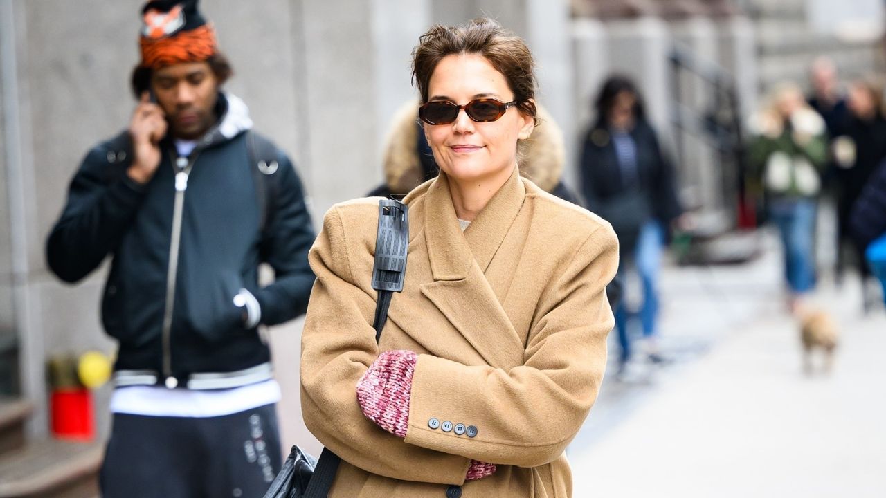 Katie Holmes out in NYC weaing a camel coat 