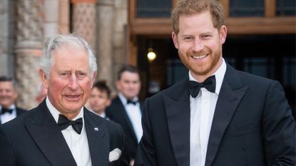 prince harry and king charles smiling together