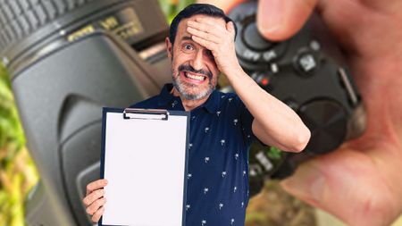 Man with anxious expression holding clipboard.