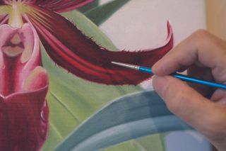Painting petal details with oil paints