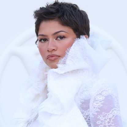 Zendaya styled Marie Antoinette-esque ruffles with the ultimate French girl denim at Louis Vuitton's Spring/Summer 2027 Paris Fashion Week show