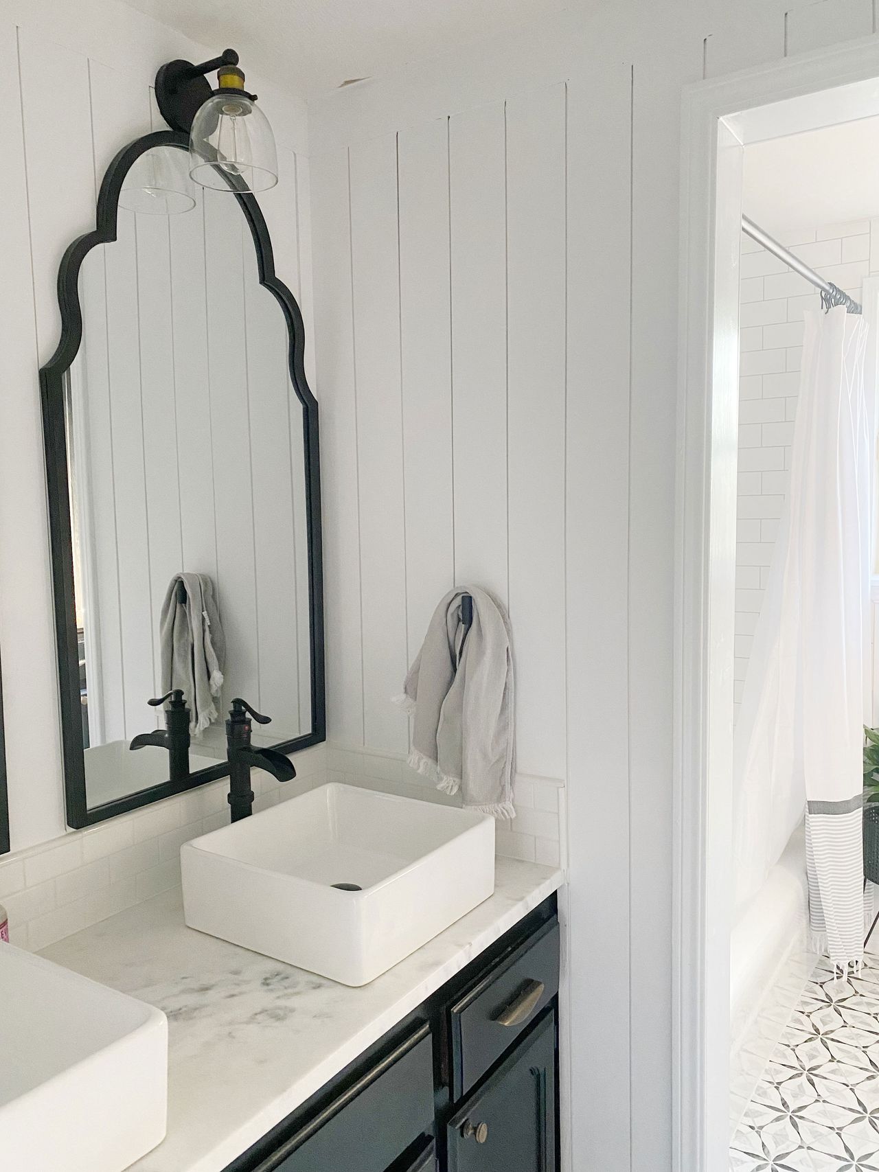 Before & After A striking black and white guest bathroom makeover on a