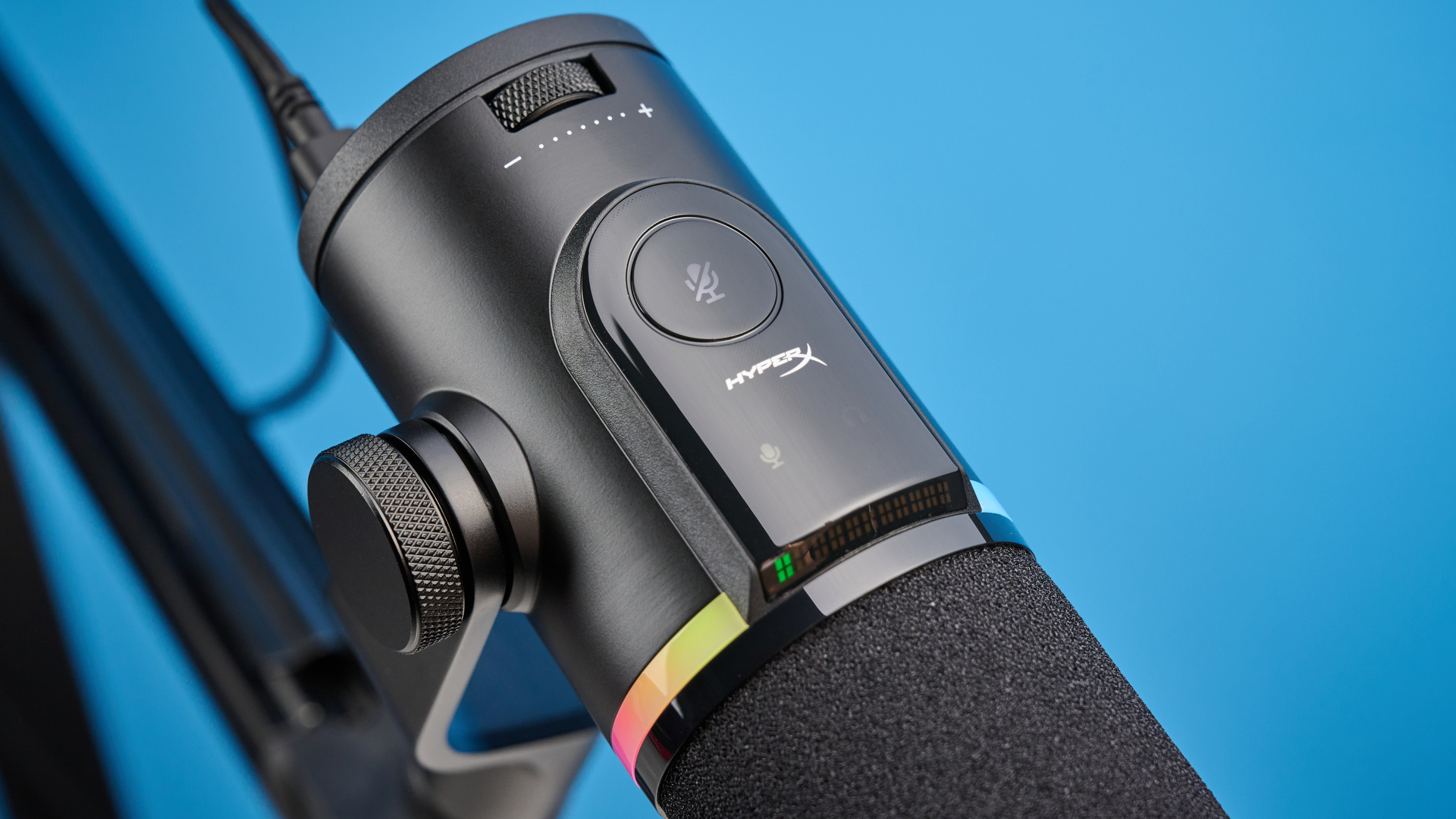 the hyperx flipcast streaming microphone on a boom arm with an RGB LED panel and an xlr and usb-c connectivity