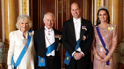 ritain's Queen Camilla, Britain's King Charles III, Britain's Prince William, Prince of Wales and Britain's Catherine, Princess of Wales pose for a picture during a reception for members of the Diplomatic Corps at Buckingham Palace