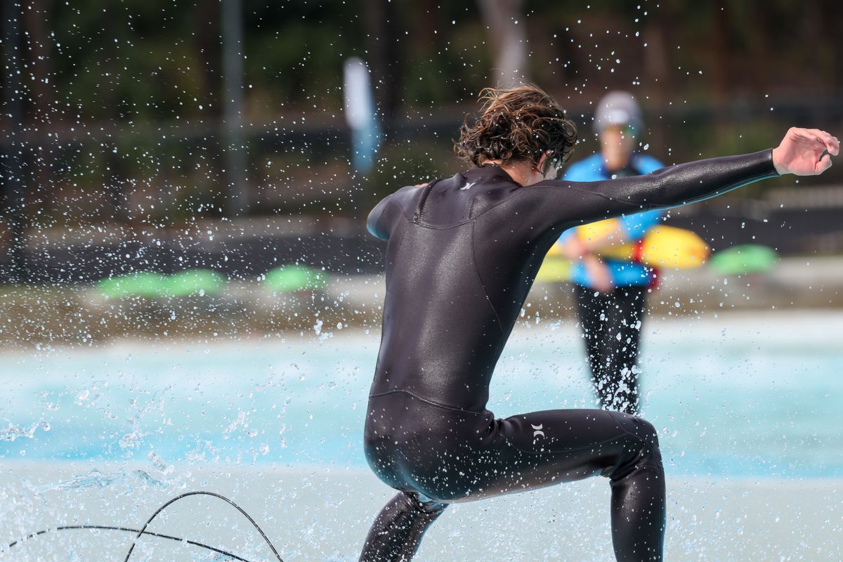 A surfer at a wave park