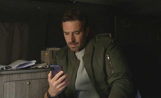 John Sugden with Nate's phone