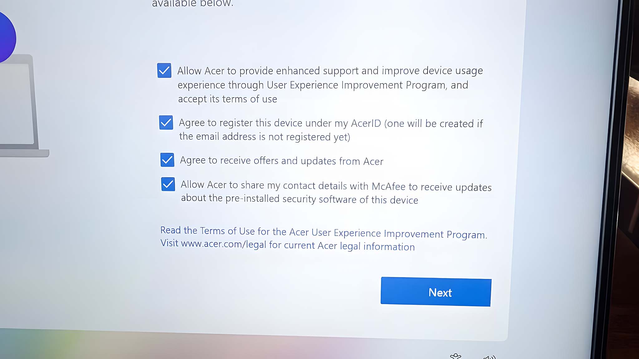 A set-up window on Acer Swift 14 AI lets you opt in or out of McAfee updates.