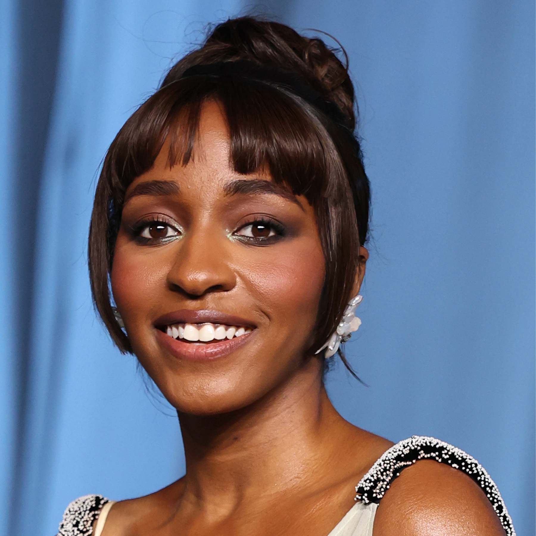 Ayo Edibiri attends the 5th Annual Academy Museum Gala at the Academy Museum of Motion Pictures with baby bangs