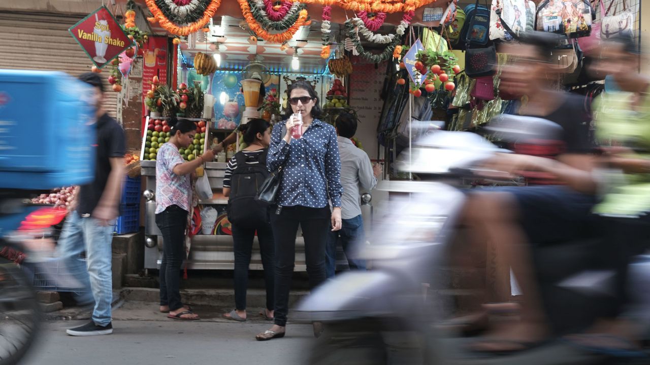 Focus on lady detective in crowd